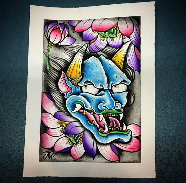 Image of ONI with lotus flowers