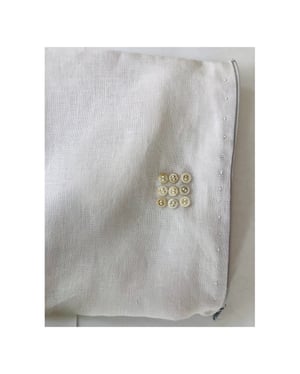 Image of moon pale lilac bag with ecru buttons