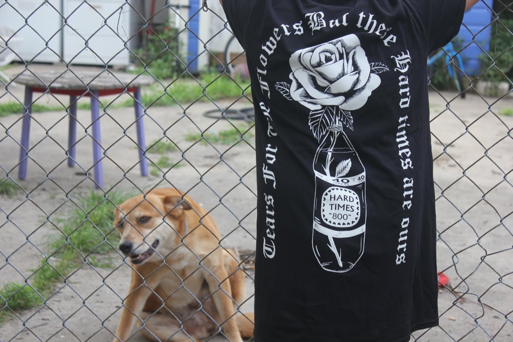 Image of "tears for the flowers but these hard times are ours" shirt