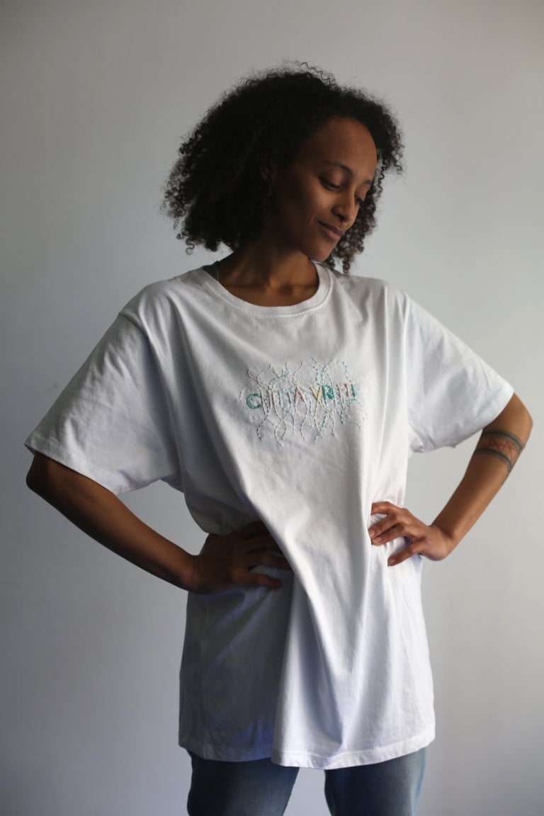 Image of LOKAH SAMASTAH SUKHINO BHAVANTU – wrapped – light blue/beige/rose – white unisex t-shirt
