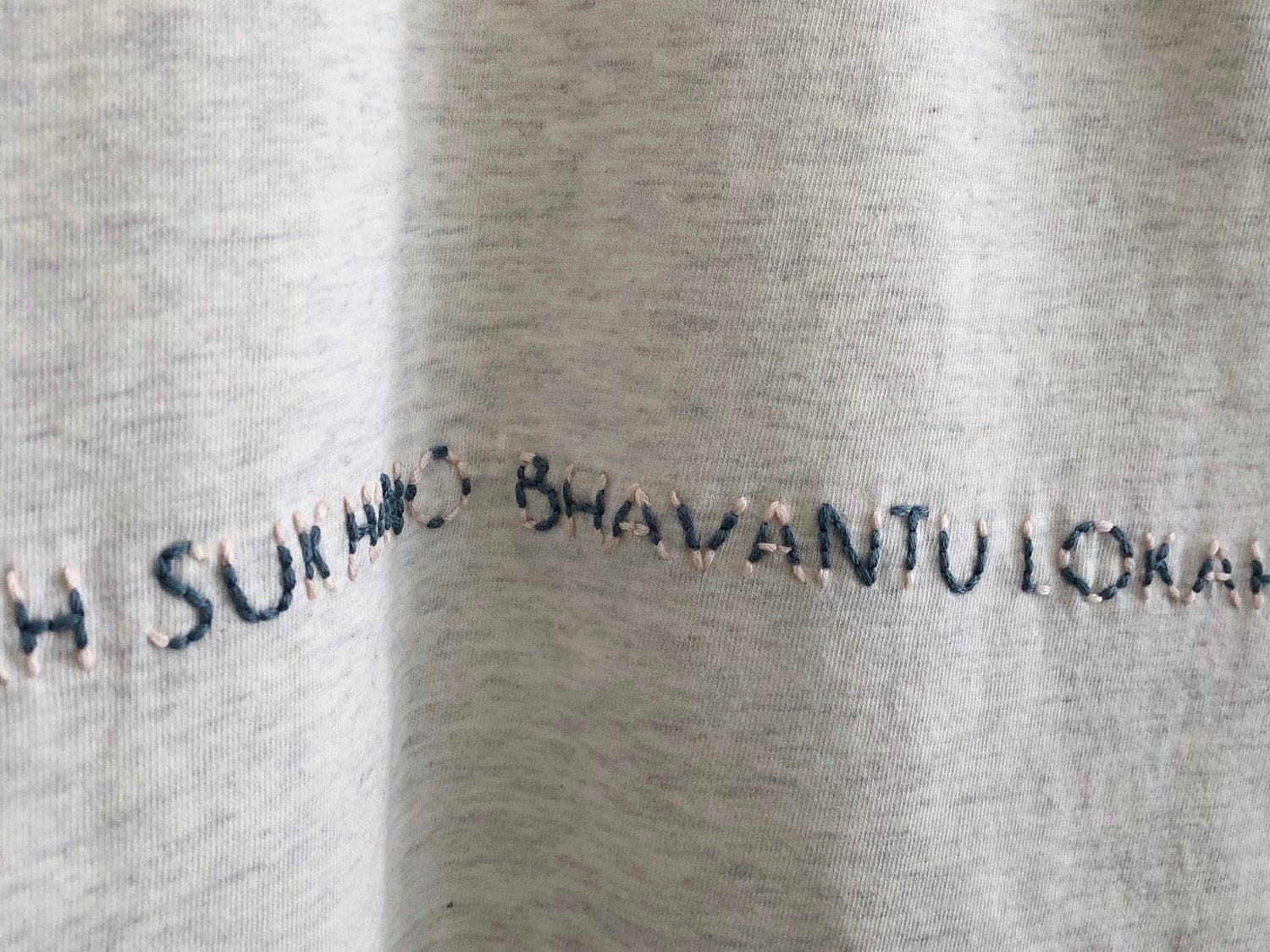 Image of LOKAH SAMASTAH SUKHINO BHAVANTU – wrapped – petrol/rose – heather gray unisex t-shirt