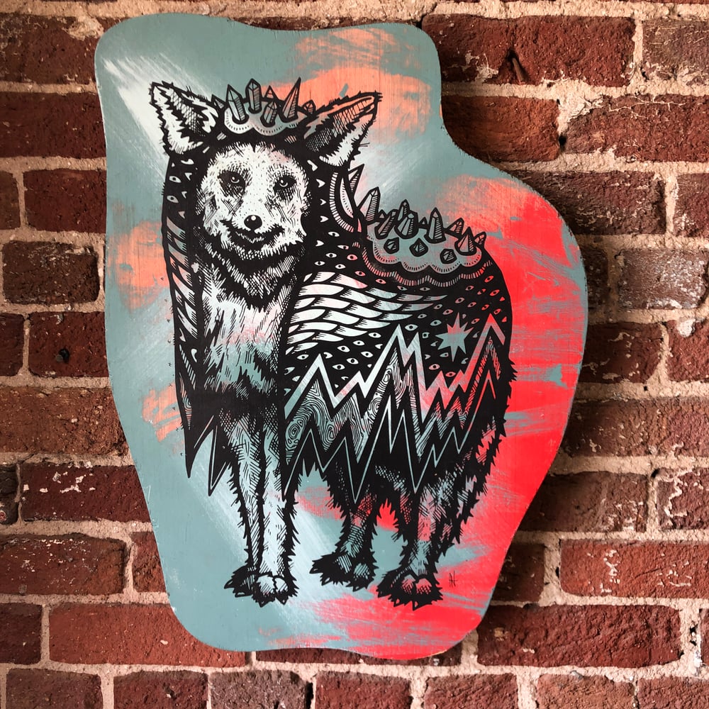 Image of Coyote in a Crystal Cloak on Raised Pine 