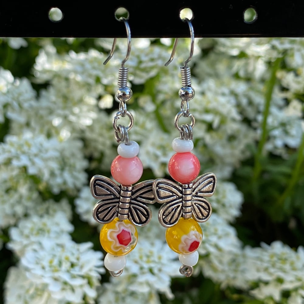 Image of daisy butterfly earrings