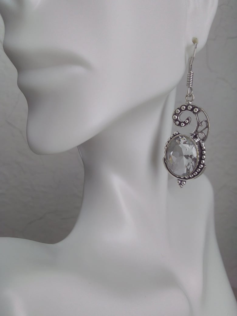 Image of SINGLE WHITE TOPAZ SWIRL DESIGN EARRINGS