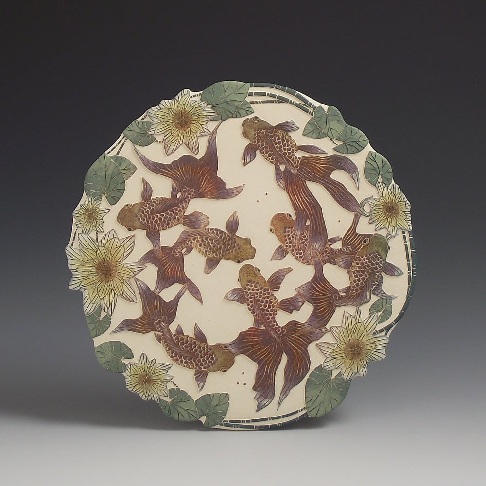 Image of Fantailed fish ceramic sgraffito wall art 