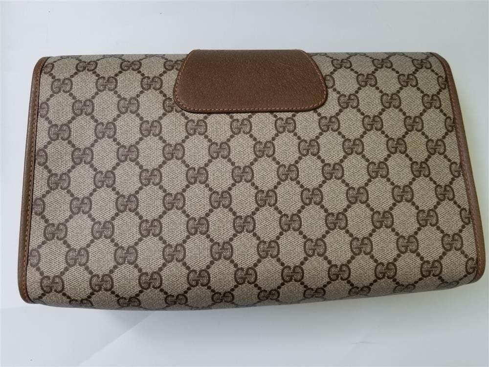 Image of Vintage Gucci brown GG monogram clucth with original box
