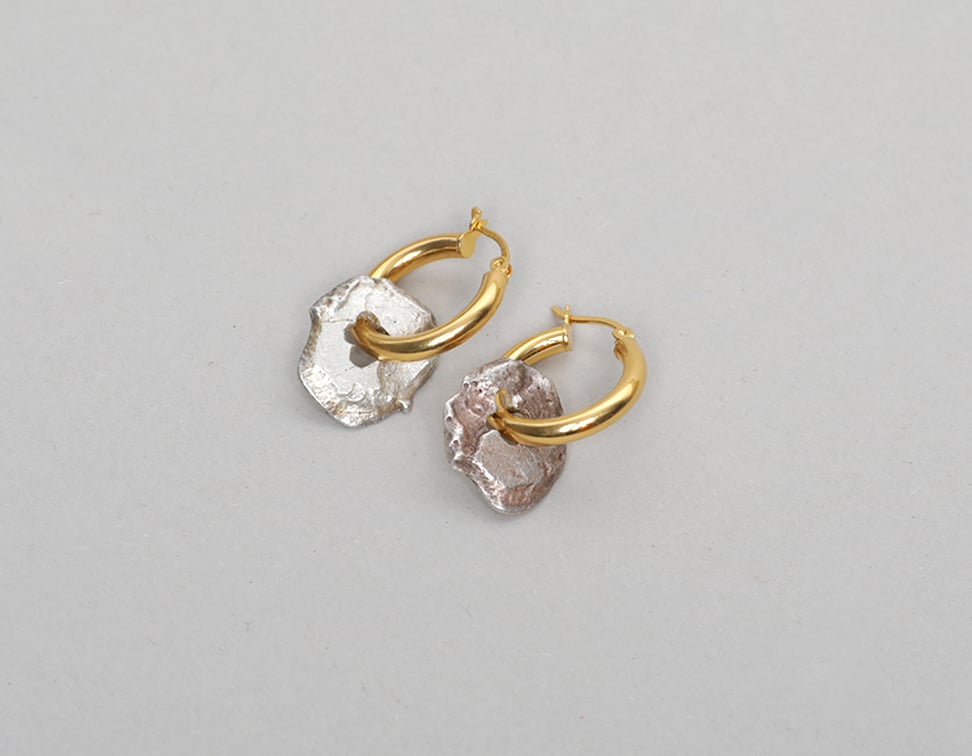 Image of Discus dangle earrings