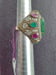 Image of EMERALD AND RUBY BRONZE AND SILVER RING