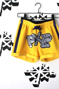Image of top notch shorts in yellow 