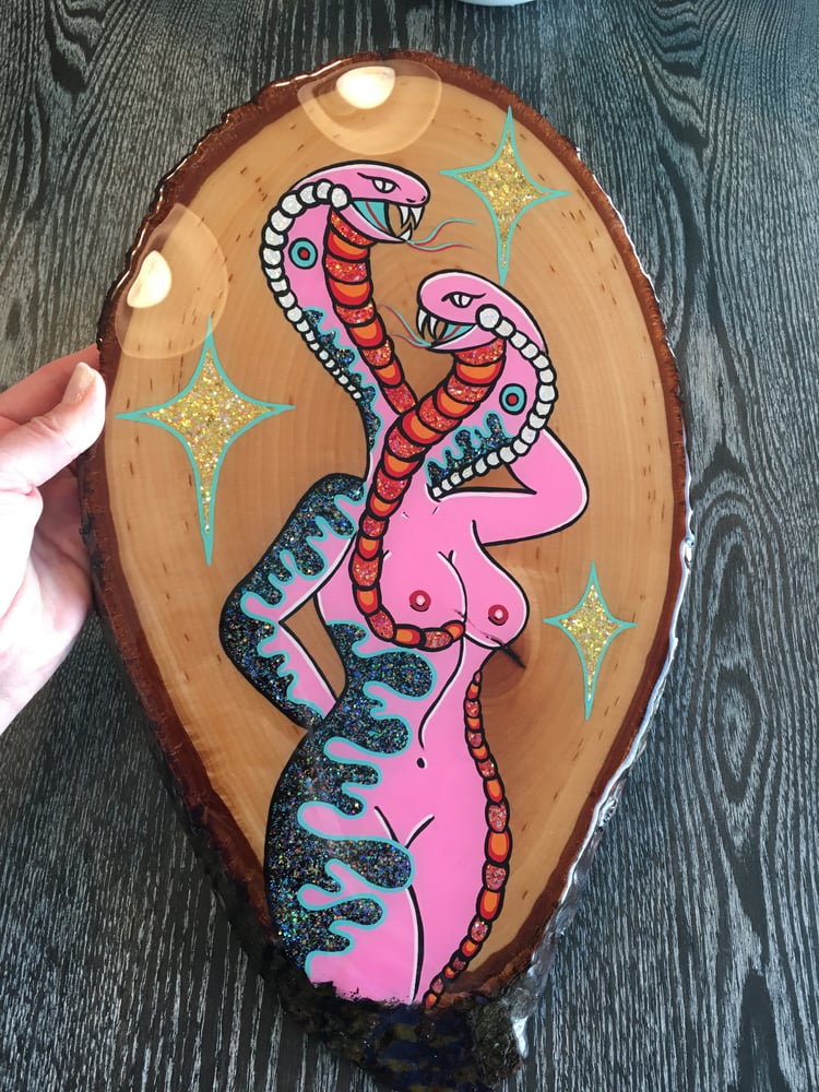 Image of 2 headed cobra lady