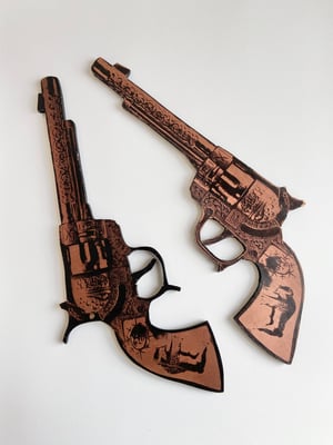 Image of Oversized Toy Revolvers by Charlie Evaristo-Boyce