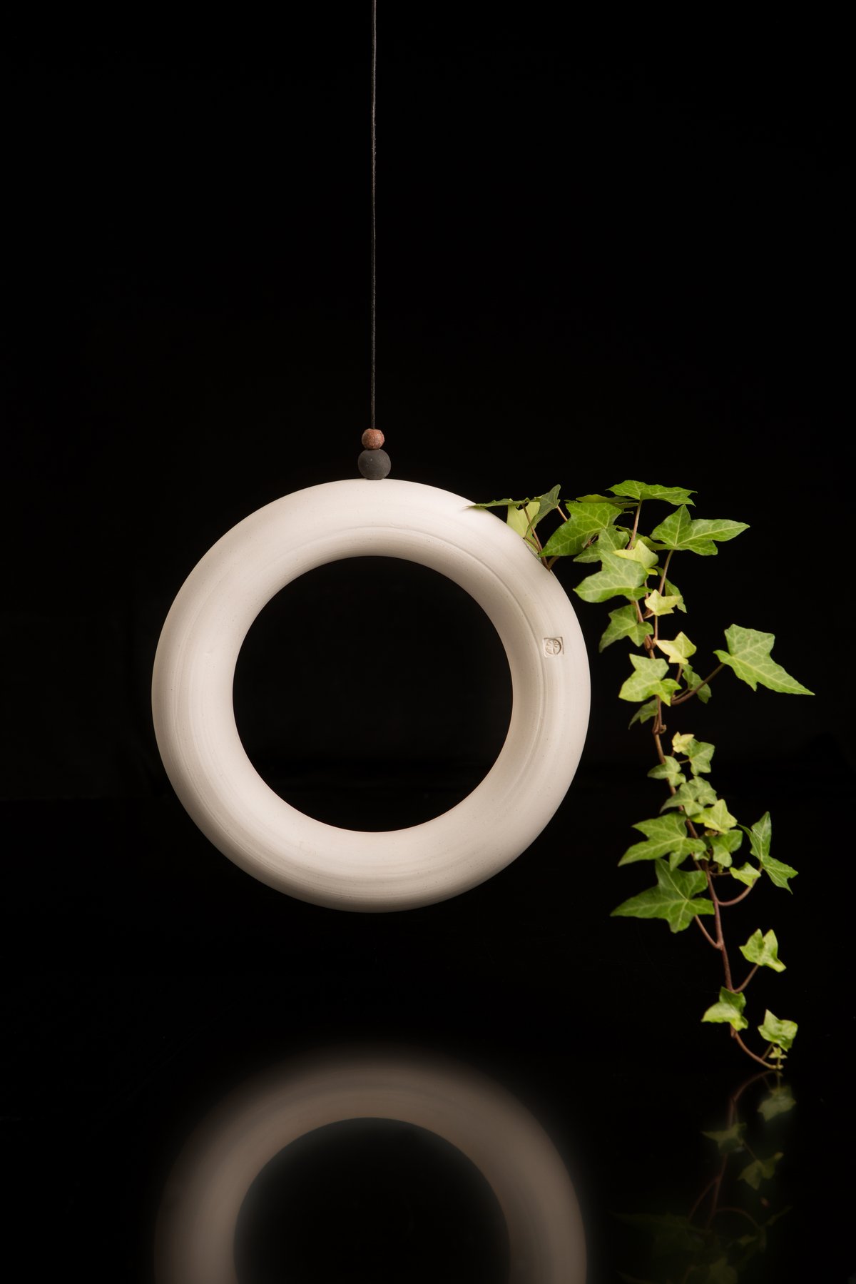 Hanging moon vase