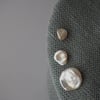 Pendientes de perlas montados en plata Hojas