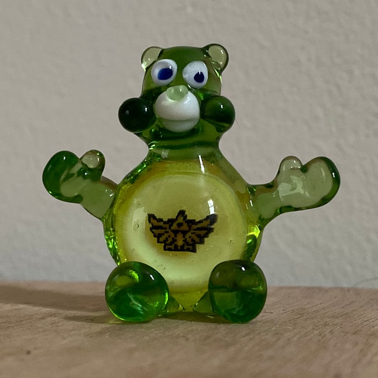 Image of Winged Triforce Fogueybear Glass Pendant