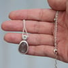 Grey moonstone pendant with star bail