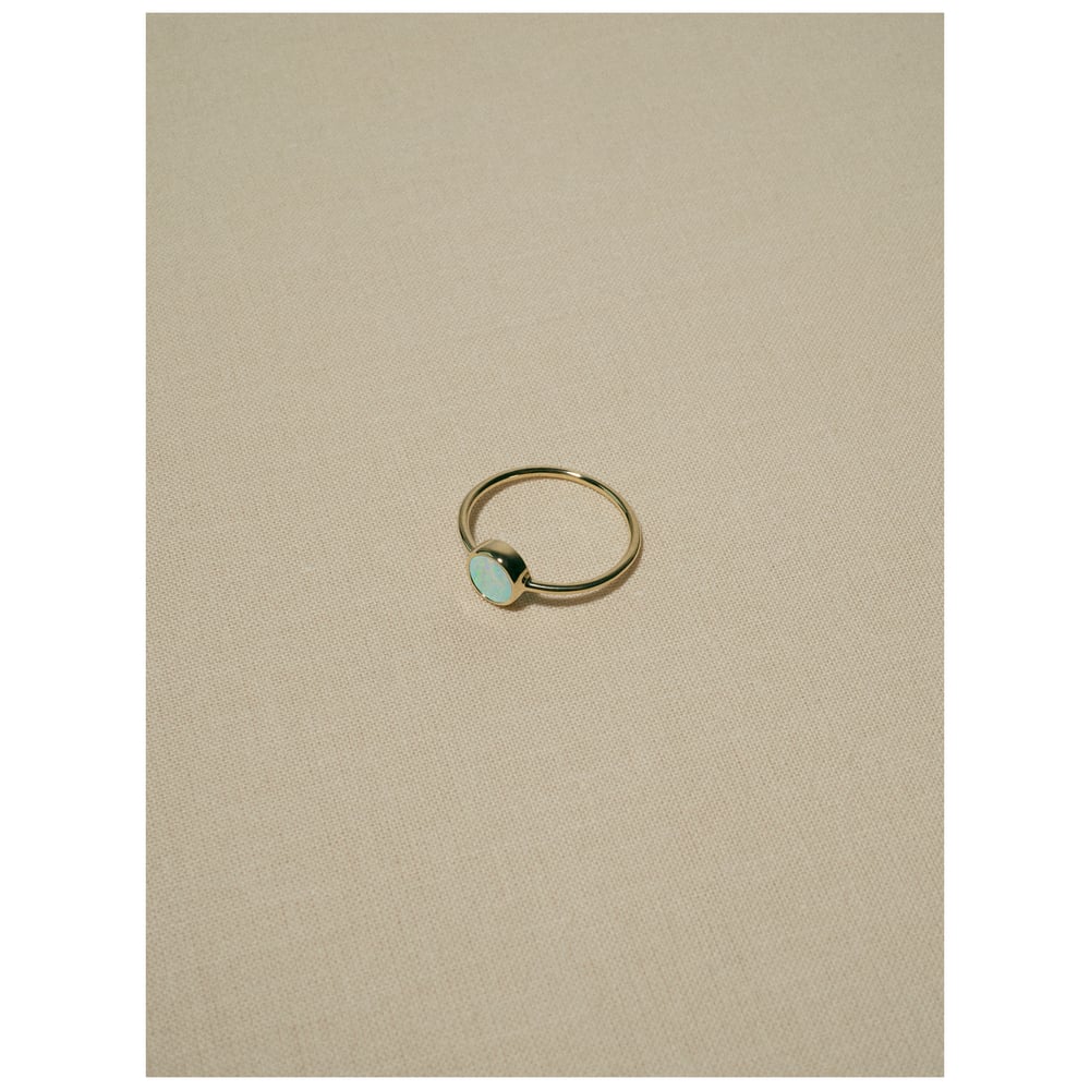 Image of gem opal ring · gold