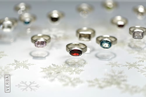 Image of "Love conquers all" silver ring with garnet · OMNIA VINCIT AMOR ·