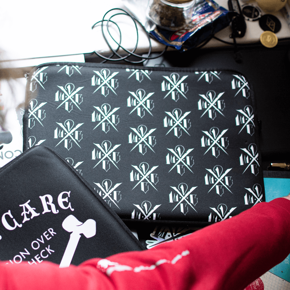 Image of DCWC LAPTOP SLEEVE - LOGO REPEAT
