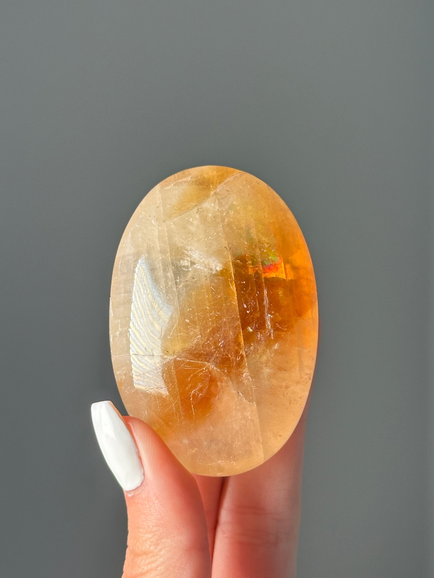 MYSTERY HONEY OPTICAL CALCITE PALM STONES