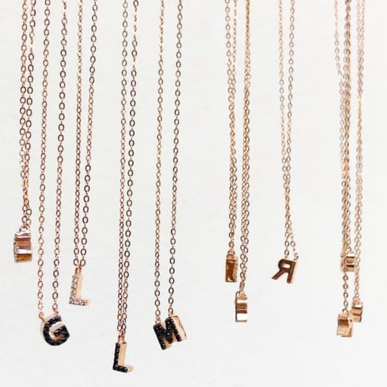 Image of COLLANA MONOGRAM ZIRCONI