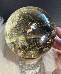 Image 3 of Golden Rutile In Smoky Quartz Sphere #1769