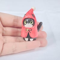 Image 1 of Santa coat tuxedo cat ceramic figurine