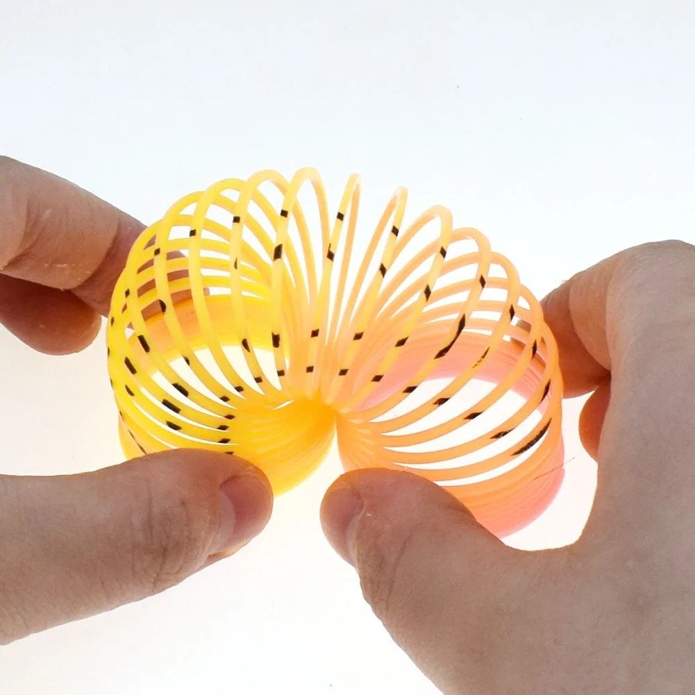 Image of 24PCS Rainbow Magic Springs Circle Toys Kids Birthday Party Favors Guests Giveaway Small Gifts Pinat