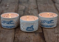 Image 2 of Stoneware votive candle holder featuring Hare and hound 