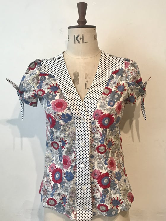 Image of Spotty and floral handkerchief blouse