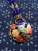 Image of Blue flower enamelled handbag necklace