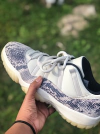 Jordan 11 low light bone grey snake skin