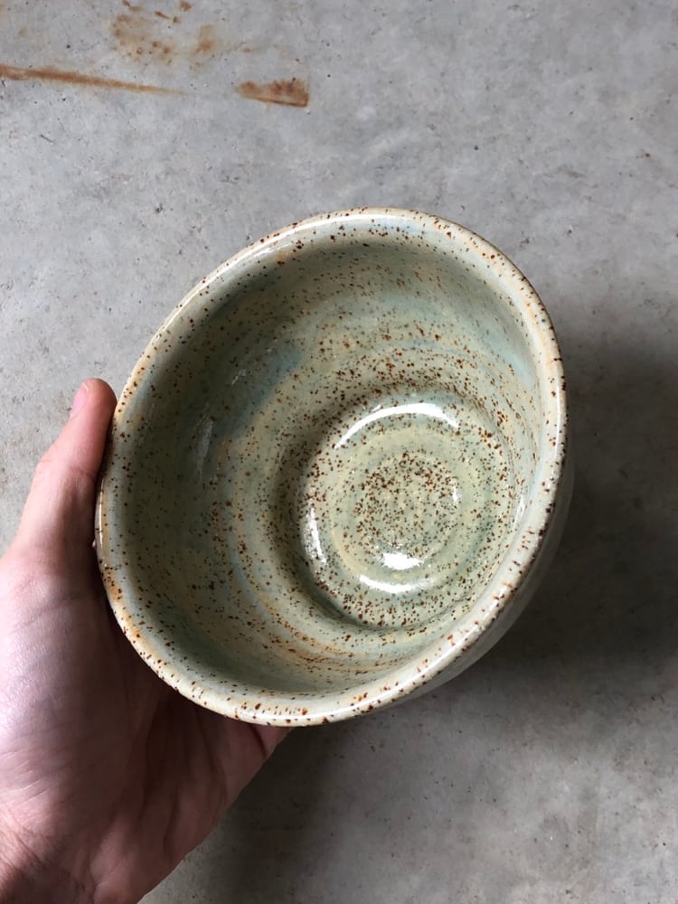 Image of footed speckled bowl in sage