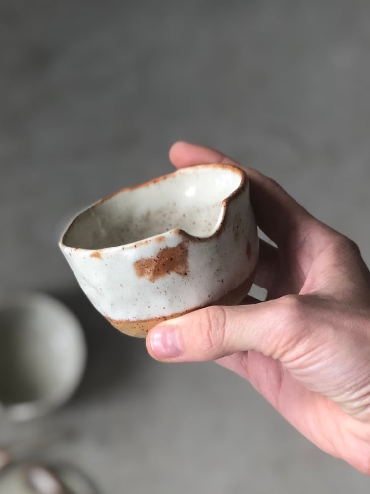 Image of small lidded bowl with spoon