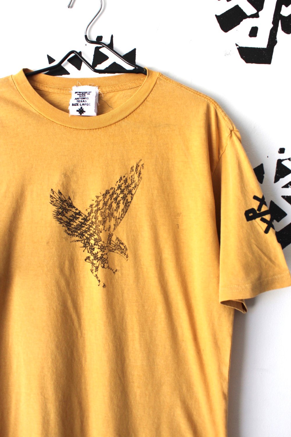 fly in fly out tee in gold 