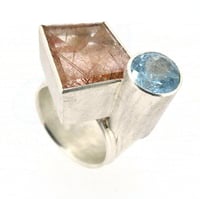 Image 2 of Intergrown forms ring. Rutile quartz and aquamarine in silver. Chris Boland Contemporary Jewellery