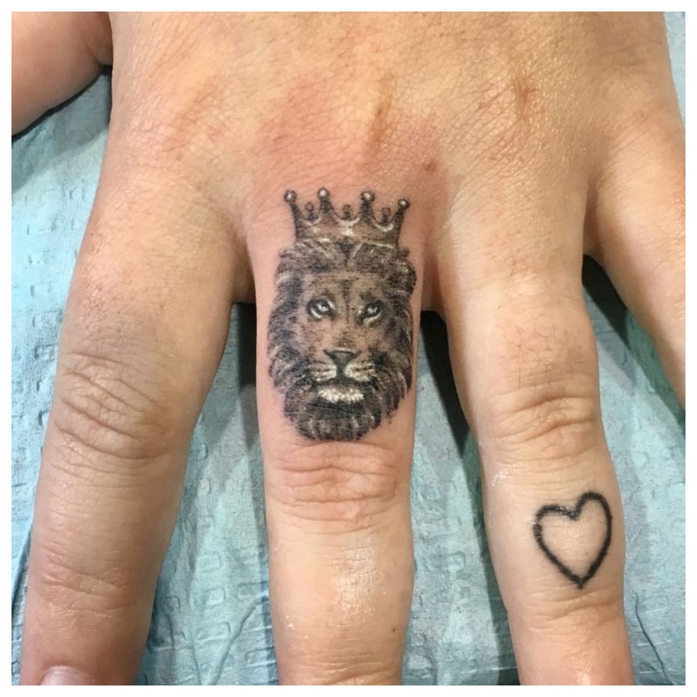 T.O.T finger tats