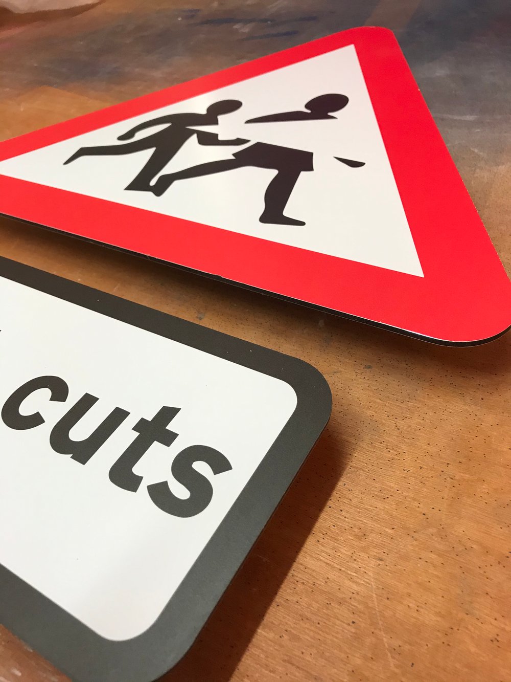 Image of Youth Cuts Metal Road Sign