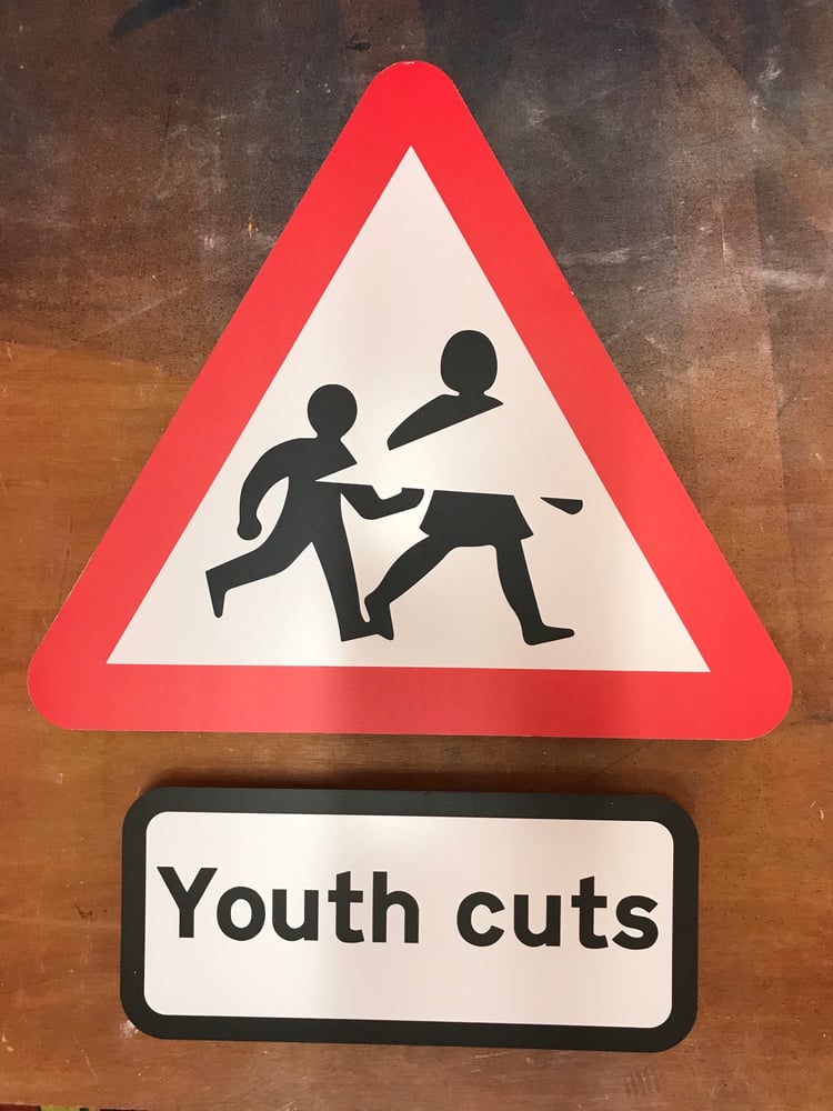Image of Youth Cuts Metal Road Sign
