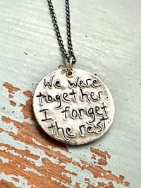 Image 13 of green sapphire pendant with handwritten quote