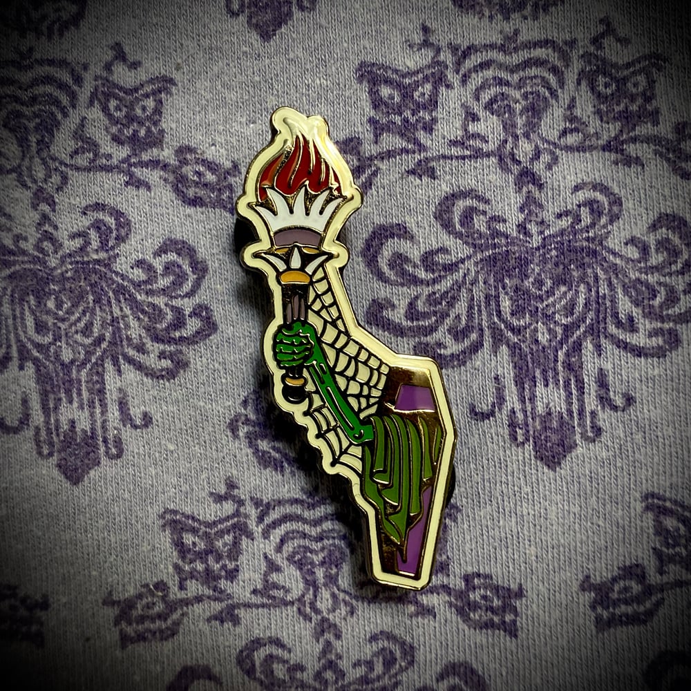 Image of Torch 10th Anniversary enamel pin