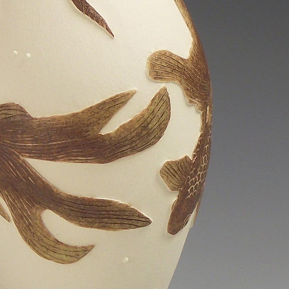 Image of Long fantailed fancy fish ceramic sgraffito vessel
