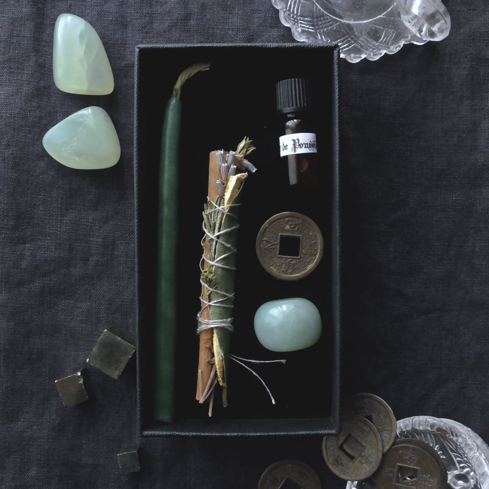 Image of CABRE D'OR. ABUNDANCE THEMED BOX ↟ organic smoke wand, lucky feng-shui coin, candle, green jade