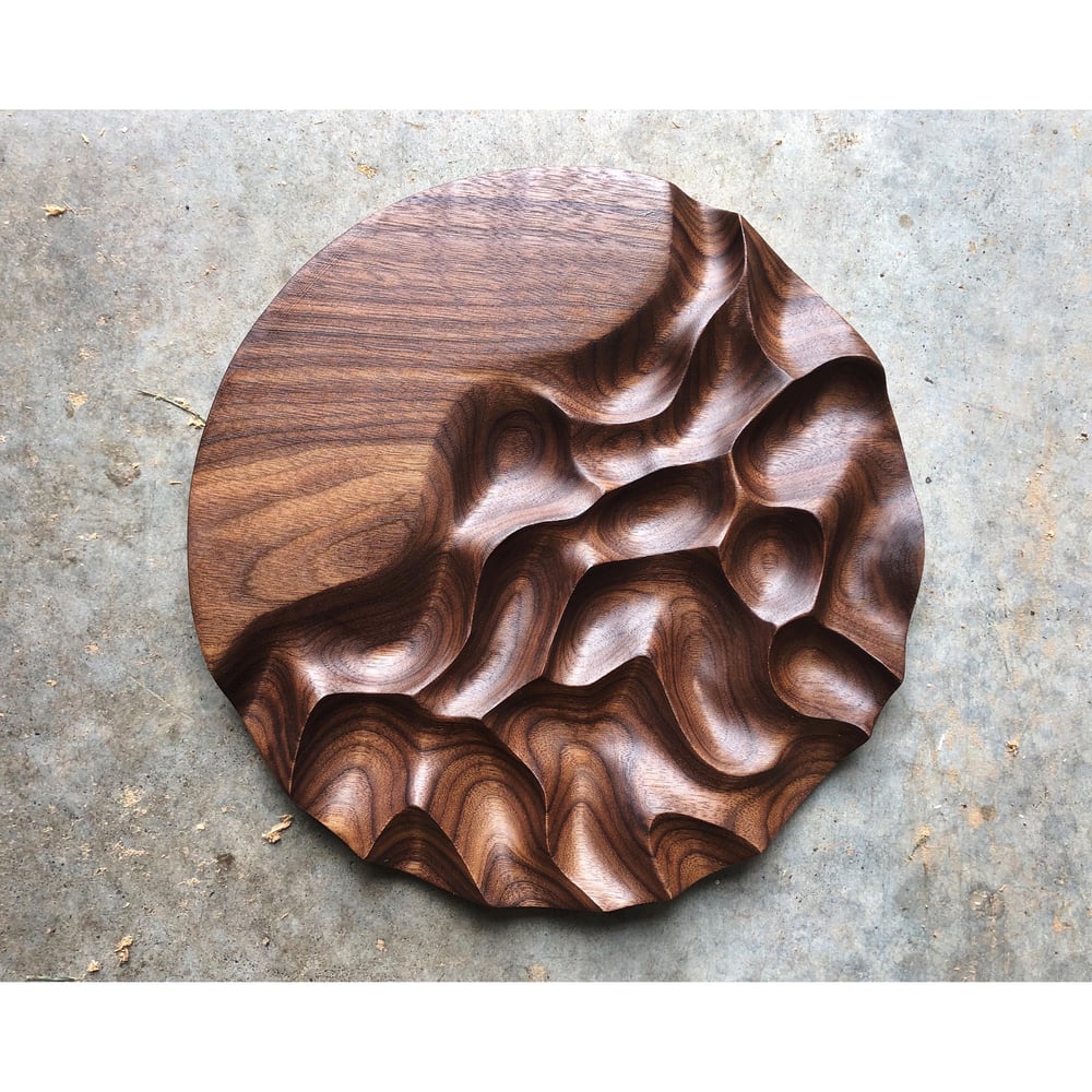 Image of Liquid swords. Walnut carving 