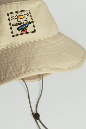 Image of "Eggnite Me" Bucket Hat