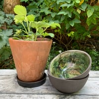 Image 5 of Small black clay bowl, white slip & green glaze interior