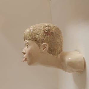 HEADS "LINGUACCIA" wall sculpture