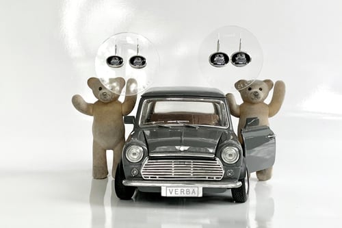 Image of "Life is a journey" teddy-bear silver earrings with photo and rock crystal · PEREGRINATIO EST.. ·