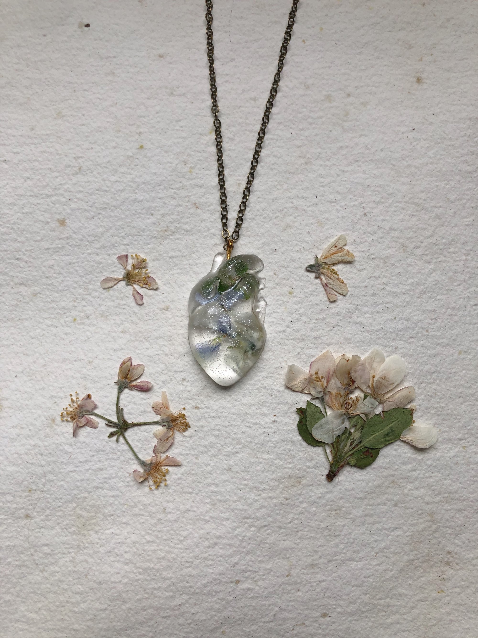 Image of baby blue anatomical heart pendant