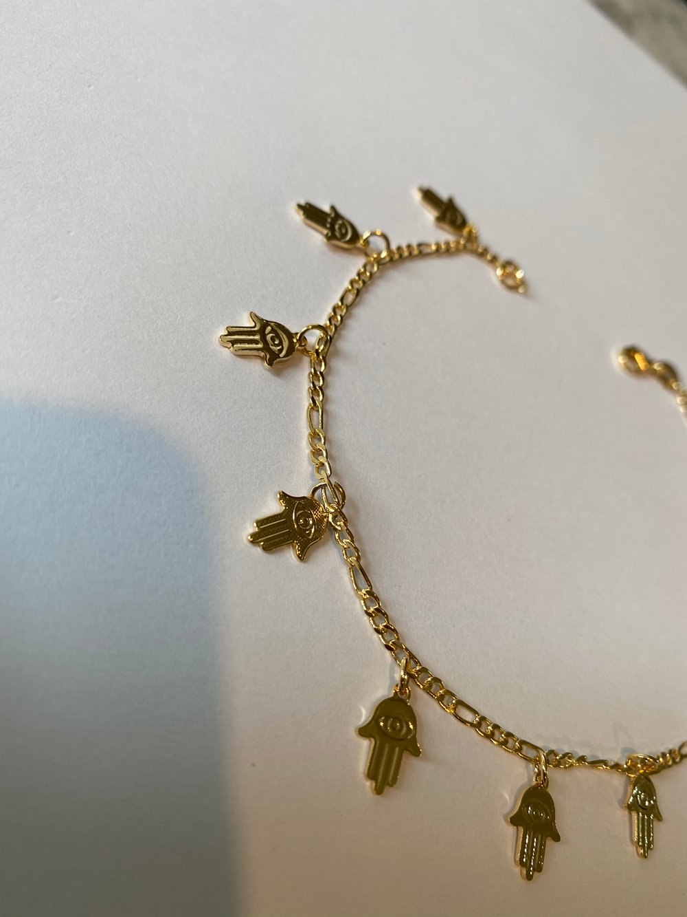 Tiny hamsa anklet