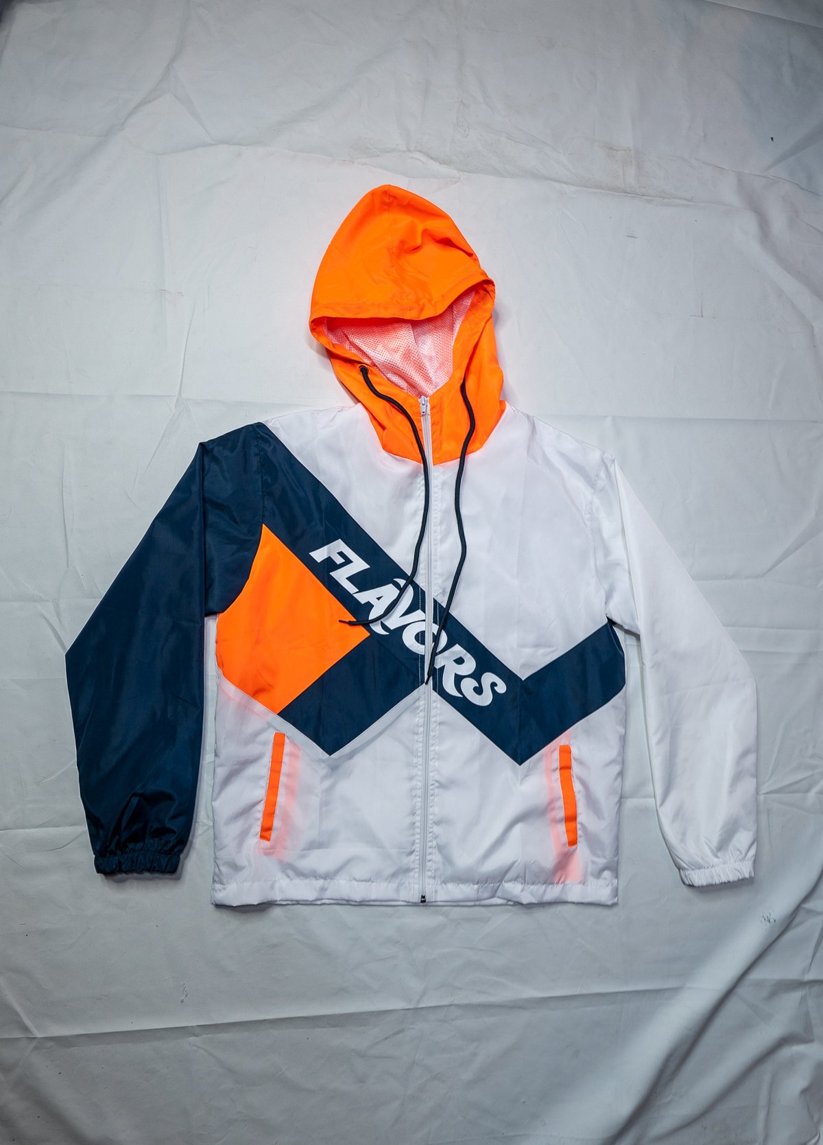 orange and white jogging suit